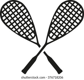 Squash crossed rackets