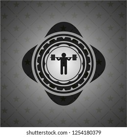 squat icon inside black emblem