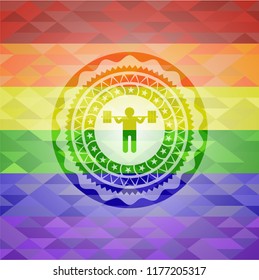 squat icon inside emblem on mosaic background with the colors of the LGBT flag