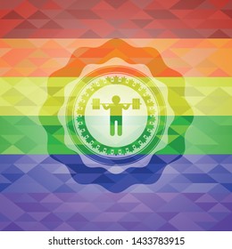 squat icon inside emblem on mosaic background with the colors of the LGBT flag
