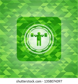 squat icon inside green emblem. Mosaic background