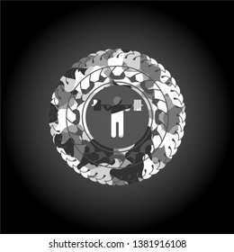 squat icon inside grey camouflaged emblem