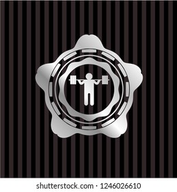 squat icon inside silvery emblem