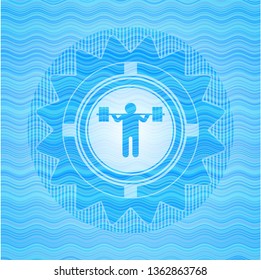 squat icon inside water style emblem.