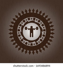 squat icon inside wood badge or emblem