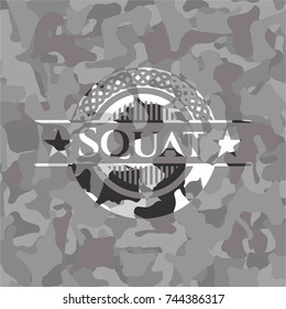 Squat on grey camouflage texture