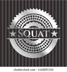 Squat silver shiny badge