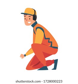 Squatting Professional Mechanic Cartoon Character in Unifrom and Earphones, Maintenance of Racing Car, Pit Stop Crew Member Vector Illustration