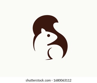 Squirrel look back negative space logo design inspiration