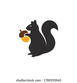 Squirrel silhouette vector with a acorn on a white background