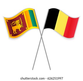 Sri Lankan and Belgian crossed flags. Sri Lanka combined with Belgium isolated on white. Language learning, international business or travel concept.