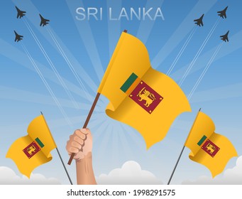 Banderas de Sri Lanka ondeando bajo el cielo azul