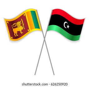 Sri Lankan and Libyan crossed flags. Sri Lanka combined with Libya isolated on white. Language learning, international business or travel concept.