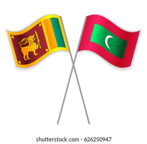 Sri Lankan and Maldivian crossed flags. Sri Lanka combined with Maldives isolated on white. Language learning, international business or travel concept.