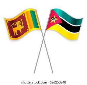 Sri Lankan and Mozambican crossed flags. Sri Lanka combined with Mozambique isolated on white. Language learning, international business or travel concept.