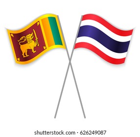 Sri Lankan and Thai crossed flags. Sri Lanka combined with Thailand isolated on white. Language learning, international business or travel concept.