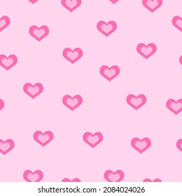 Día de San Valentín. Patrón sin foco con corazones pequeños rosados. Fondo rosa. Ornamento decorativo. Amor y romance. Plantilla para postales, papel tapiz, papel textil, raspado y papel envolvente