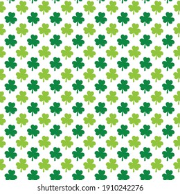 St. Patrick’s day shamrock seamless pattern. Green white clover leaves background.  Saint Patricks backdrop. Vector template for fabric, textile, wallpaper, wrapping paper, etc. 