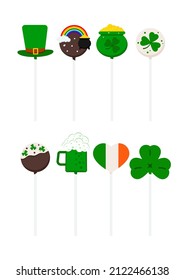 St Patrick cake pops set isolated on white background. Cute irish candy food - icing lollipop with leprechaun hat, clover shamrock, pot with gold. Flat design cartoon style dessert vector illustration