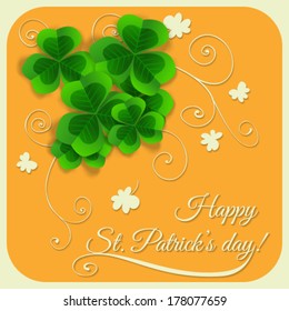  St. Patrick day card, bunch of clovers on orange background with  hand - drawn floral ornaments white paper clovers 
