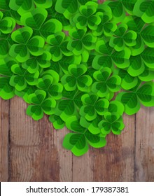  St. Patrick day card, bunch of clovers on wooden background