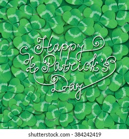 St. Patrick day card. Green background covered with many three leaf clovers and lettering.
