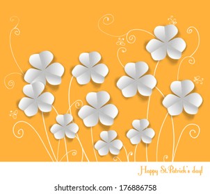 St. Patrick day card, white paper clovers on orange background with hand - drawn floral ornaments and stylized butterflies