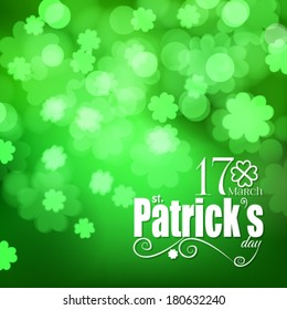 St. Patrick  day card, white paper lettering on beautiful spring bokeh background