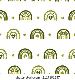 St. Patrick day seamless pattern with boho rainbow. Childish print for irish holidays. Scandinavian design for clothes, wrapping paper, fabric, wallpaper. Cute vector illustration with shamrock.