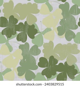 St Patrick Day. Seamless pattern with little four leaf clovers. Clover sign symbol pattern. Simple Repeatable design. Good luck symbol of Ireland