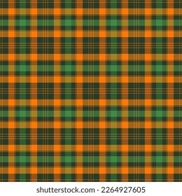 St. Patrick day tartan plaid. Scottish pattern in orange and green cage. Scottish cage. Traditional Scottish checkered background. Seamless fabric texture. Vector illustration
