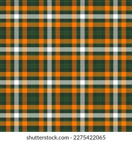 St. Patrick day tartan plaid. Scottish pattern in orange, white and green cage. Scottish cage. Traditional Scottish checkered background. Seamless fabric texture. Vector illustration