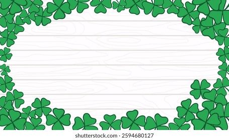 St. Patrick s Day Frame with copy space. Green leaves on white wooden texture backdrop. Shamrock and clover template, banner, background