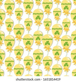 St. Patrick's background. Shamrock balloons. Seamless pattern with yellow balls on a white background. Vector template, ornament for textiles, packaging materials.