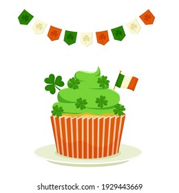 St. Patrick's cupcake with shamrock clover and the flag of Ireland. Flat cartoon vector illustration isolated on a white background.