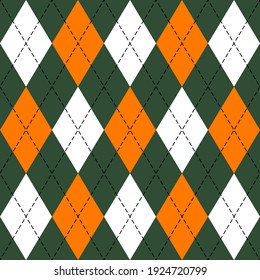 St. Patricks day Argyle plaid. Scottish pattern in green, orange and white rhombuses. Scottish cage. Traditional Scottish background of diamonds. Seamless fabric texture. Vector illustration