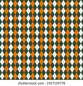 St. Patricks day Argyle plaid. Scottish pattern in green, orange and white rhombuses. Scottish cage. Traditional Scottish background of diamonds. Seamless fabric texture. Vector illustration