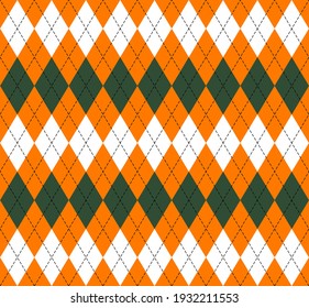 St. Patricks day Argyle plaid. Scottish pattern in green, black and orange rhombuses. Scottish cage. Traditional Scottish background of diamonds. Seamless fabric texture. Vector illustration