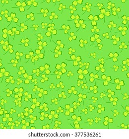 St. Patrick's day background. Clover leaves on green background. Seamless pattern. Vector illustration.
