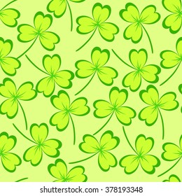 St. Patrick's day background. Clover leaves on green background. Seamless pattern. Vector illustration.