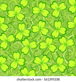St. Patrick's day background. Clover leaves on green background. Green color seamless pattern. Vector illustration.