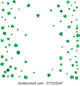 St. Patricks day background with flying clovers. 