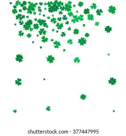 St. Patricks day background with the flying clovers leaves. 