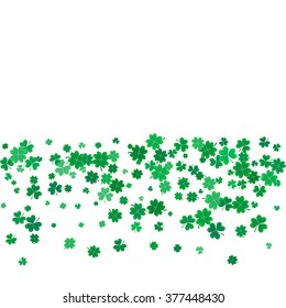 St. Patricks day background with the flying clovers. 