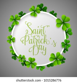 St Patrick's day background with green clover round frame isolated on gray background