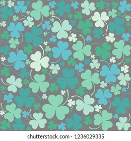 St. Patrick's day background in green colors. Seamless pattern. background with three - leaved shamrocks. St. Patrick's day holiday symbol. Irish symbols of the holiday.17 march. Vector illustration.