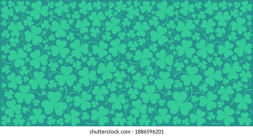 St. Patrick's day background in green colors. Seamless Pattern background with three - leaved shamrocks. St. Patrick's day holiday symbol. Irish symbols of the holiday.17 march. Vector illustration.