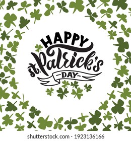 St. Patrick's Day background. Green clover leaves frame drawn in doodle style. Happy St. Patrick's day handwritten text. Modern brush ink calligraphy, hand lettering. Vector illustration 