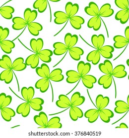 St. Patrick's day background. Green clover leaves on white background. Seamless pattern. Vector illustration.