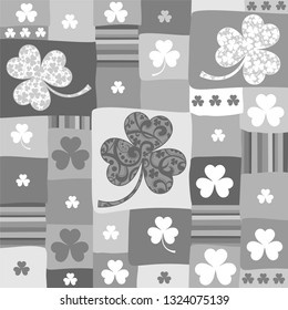 St. Patrick's day background in grey colors. Seamless pattern. Celebration background with leaf clover. Perfect for wallpapers, gift papers, patterns fills, textile. Vector illustration.
